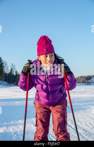 A woman learns to cross-country skiing Stock Photo