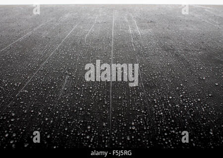 Abstract still life of water droplets of rain on a wall, Berlin, Germany Stock Photo