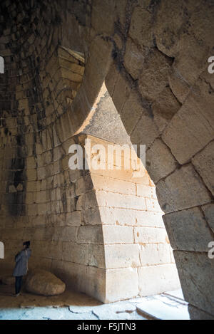 Entrance inside dome shaped chamber of the Treasury of Atreus or Tomb of Agamemnon, Mycenae, Greece Stock Photo