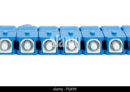 blue fiber optic SC connectors with reflection isolated on white background Stock Photo