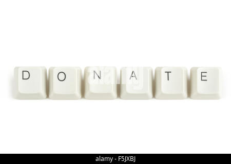 donate text from scattered keyboard keys isolated on white background Stock Photo