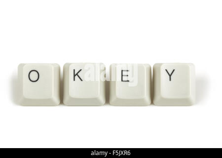 okey text from scattered keyboard keys isolated on white background Stock Photo