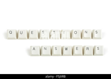 questions answers text from scattered keyboard keys isolated on white background Stock Photo