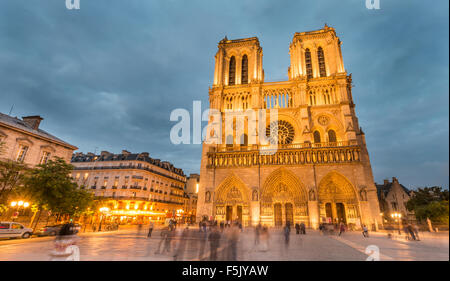 Notre Dame Cathedral at dusk, interior, western facade, Ile de la Cite, Paris, Region Ile-de-France, France Stock Photo