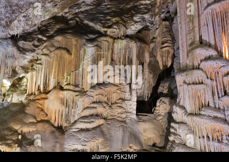 Formations inside cave with stalactites and stalagmites. Postojna cave, Slovenia. Stock Photo