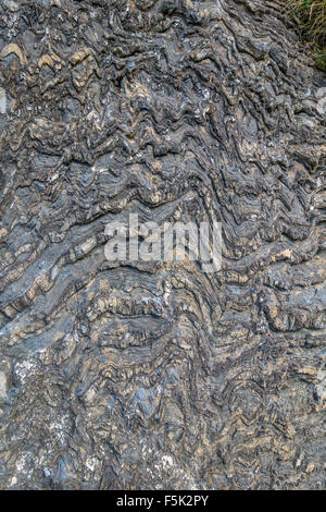 Folded gneiss rocks in pre-Alpine region, Briancon Stock Photo