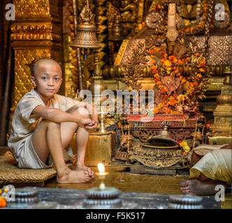 Novice at a buddhist temple in Kathmandu. Stock Photo