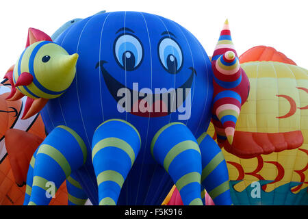 'Sea Fantasy' (left) and 'Sushi' special shape hot air balloons, Albuquerque International Balloon Fiesta, New Mexico USA Stock Photo