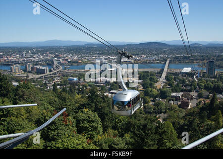 Portland, Oregon sky tram with aerial view of the city. Stock Photo