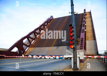 Stop sign on the E. 95th Street Bridge being raised over the Calumet River, Chicago, Illinois. Movie scene in 'The Blues Brothers' movie. Stock Photo