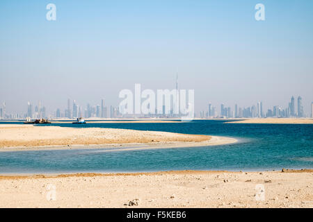 Skyline of Dubai from The World man made reclaimed islands off Dubai coast in  United Arab Emirates Stock Photo