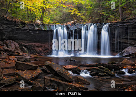 Autumn flow of Kitchen Creek as it pour over Oneida Falls in Pennsylvania’s Ricketts Glen State Park. Stock Photo
