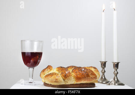 Shabbat Observance, Challah, Wine, Lit Candles Stock Photo