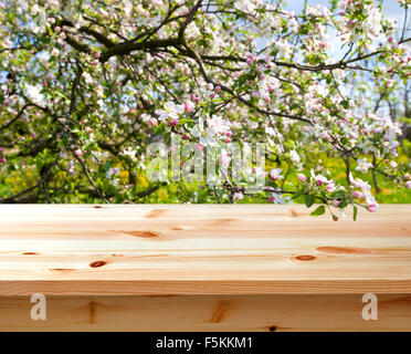 empty table in spring orchard Stock Photo