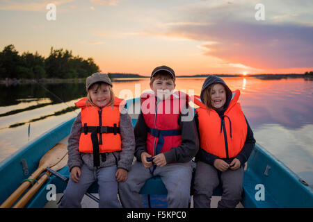 Children fishing boat life jacket hi-res stock photography and images -  Alamy