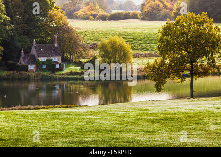 The cottage on the lake on the  Bowood Estate in Wiltshire. Stock Photo