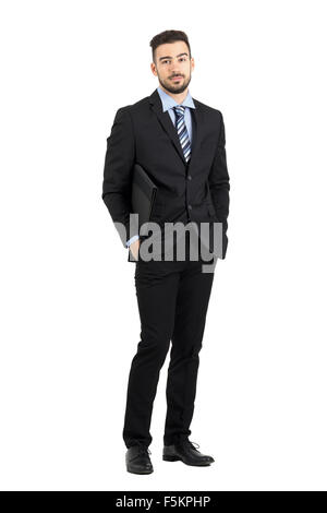 Smiling positive young bearded businessman with document folder. Full body length portrait isolated over white studio background Stock Photo