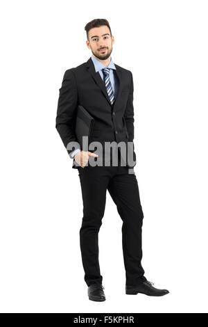 Confident young lawyer carrying documentation data folder. Full body length portrait isolated over white studio background Stock Photo