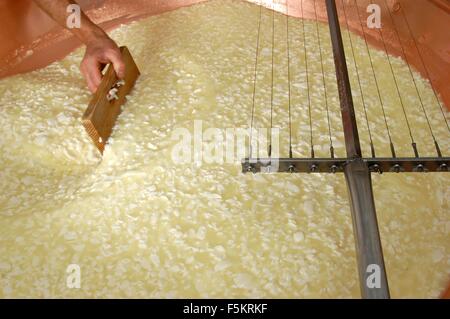 Agordino cheese, malga production of traditional cheese - Laste di Rocca Pietore,  Agordino, Belluno, Veneto, Italy    Credit © Stock Photo
