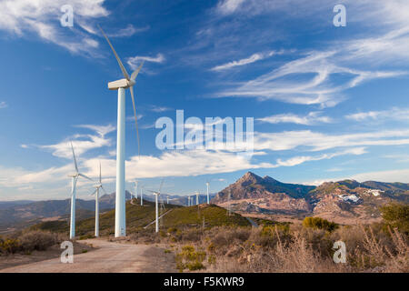 Wind Turbines generating electricity on a remote hillside in Spain Stock Photo