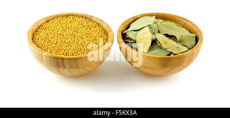 Mustard pods with bay laurel leaf studio isolated on white Stock Photo