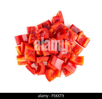 Aerial macro of chopped up red pepper isolated on white Stock Photo