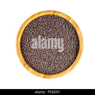 Aerial shot of black and brown mustard seeds in a round bamboo bowl, isolated on white. Stock Photo