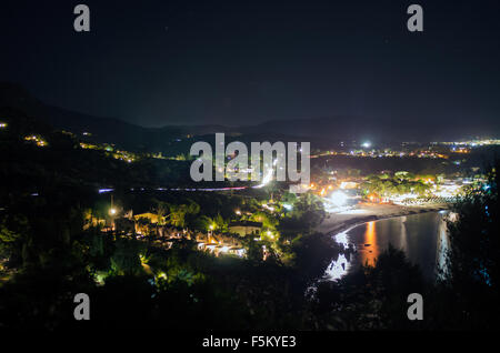 Coastal Landscape in the night with lights, colors, hills and beach. Villasimius Campus Details (Sardinia) Stock Photo
