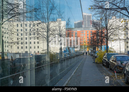 Urban street scene reflected in building windows, Mitte, Berlin, Germany, Europe Stock Photo