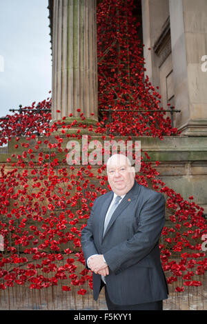 Liverpool, Merseyside, UK. 6th November, 2015. Liverpool Mayor Joe Anderson at The 'Weeping Window' poppy installation at St. Georges Hall in Liverpool.  The sculpture has been built by volunteers in commemoration of the fallen heroes of two world wars.  The poppies will be draped like a flowing river, meandering down the steps of St. Georges Hall.  The stunning display will be completed & unveiled for Remembrance Sunday on November 8th. Credit:  Cernan Elias/Alamy Live News Stock Photo