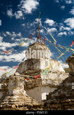 India, Himachal Pradesh, Spiti Valley, Kibber, Buddhist chorten and prayer flags at entrance to village Stock Photo