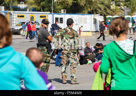 Syrian migrants fleeing the war and escaping to Europe, who have landed on the Greek island of Lesvos on the north coast at Efth Stock Photo