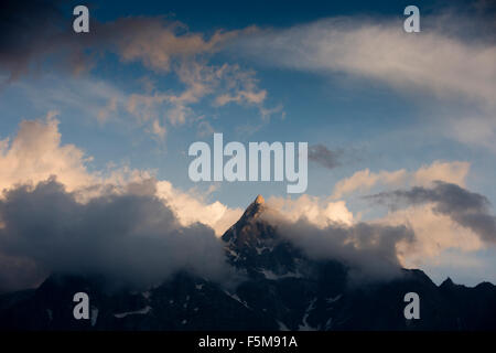 India, Himachal Pradesh, Reckong Peo, Kalpa, Shivling Peak, birthplace of Shiva emerging from clouds Stock Photo