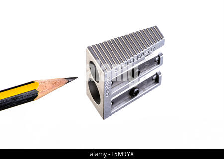 Pencil and metal sharpener Stock Photo