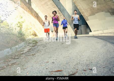 Joggers running on bridge, Arroyo Seco Park, Pasadena, California, USA Stock Photo