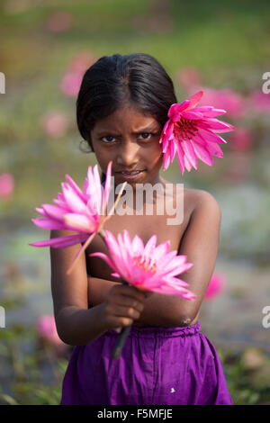 Picture of a young teenage girl fishing in a lake in the Limousin region of  France with the rod bending under the strain Stock Photo - Alamy