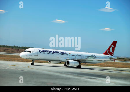 A Turkish Airlines plane standing on the tarmac viewed from inside Ercan airport in Nicosia Northern Cyprus  KATHY DEWITT Stock Photo