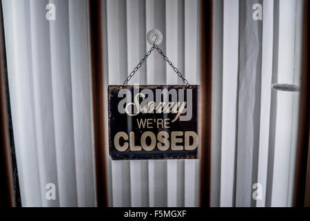 Sorry We're Closed sign hanging on a door Stock Photo