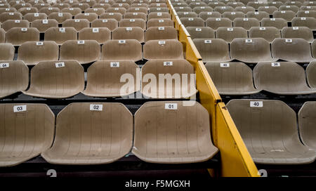 Rows of empty stadium seats Stock Photo