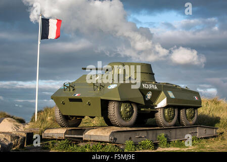 M8 Greyhound light armoured car of the Forces françaises libres / FFL, Utah Beach, Saint-Martin-de-Varreville, Normandy, France Stock Photo