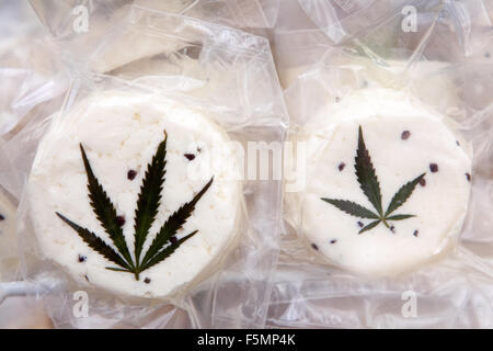 Sheep's cheese vacuum-packed, decorated with a cannabis leaf Prague Czech Republic Family farm product Stock Photo