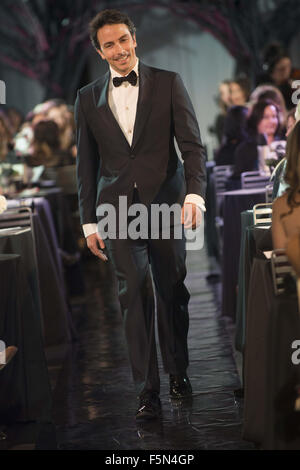 Calgary, Alberta, Canada. 6th Nov, 2015. A Male Model featuring a Tuxedo, Shirt and Bow Tie from Armani starts off the Fairytales & Legends Fashion Gala by Holt Renfrew. Credit:  Baden Roth/ZUMA Wire/Alamy Live News Stock Photo