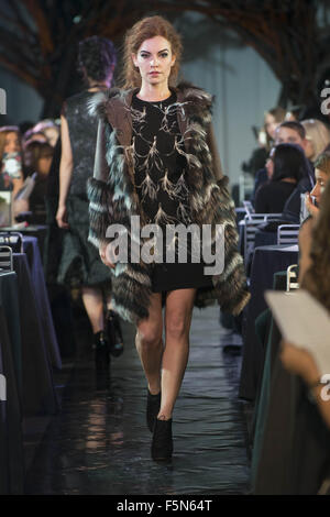 Calgary, Alberta, Canada. 7th Nov, 2015. A female model walks the Catwalk at HOLT RENFREW's Fashion Gala in Calgary features a dress from LANVIN & a jacket exclusively by HOLT RENFREW. Credit:  Baden Roth/ZUMA Wire/Alamy Live News Stock Photo