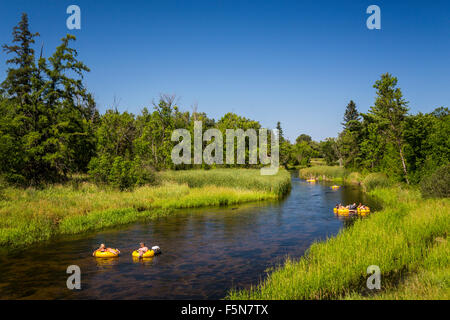 Tubing on the Otter-Tail River in Northern Minnesota, USA. Stock Photo