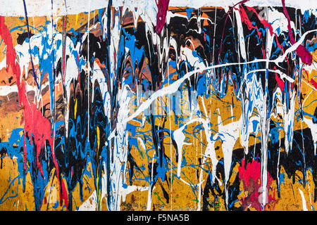 Dripping paint graffiti wall Stock Photo