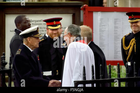 London, Nov 5th 2015. The Duke of Edinburgh and Prince Harry say goodbye to the Very Reverend John R Hall, dean of Westminster.. Stock Photo