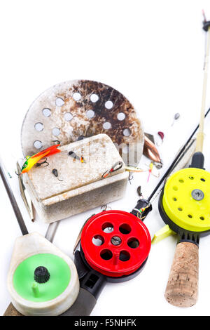 closeup ice-fishing rods, tackles and equipment on white background Stock Photo