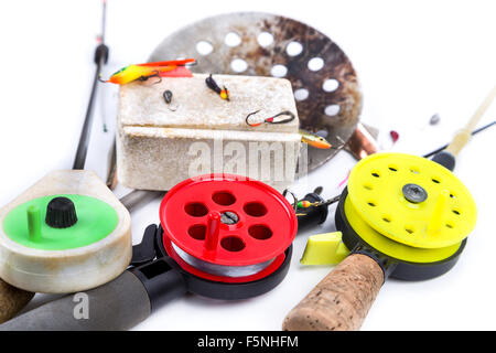 closeup ice-fishing rods, tackles and equipment on white background Stock Photo