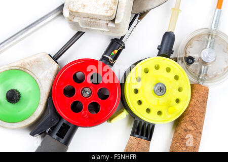 closeup ice-fishing rods, tackles and equipment on white background Stock Photo