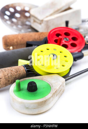 closeup ice-fishing rods, tackles and equipment on white background Stock Photo